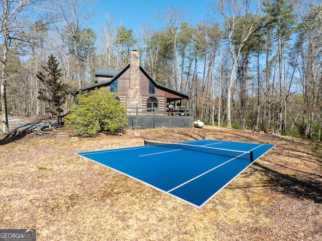 exterior space featuring a wooden deck