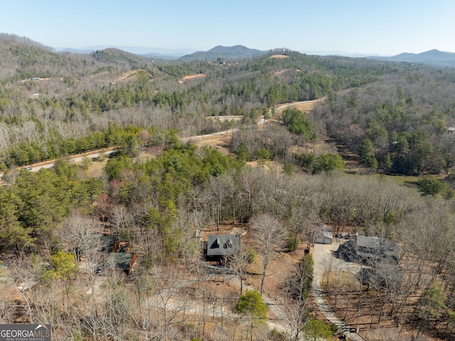 bird's eye view featuring a mountain view and a forest view