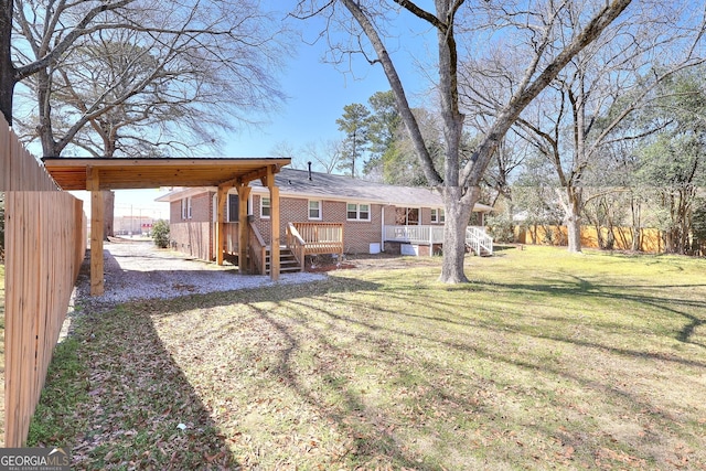 view of yard featuring a wooden deck