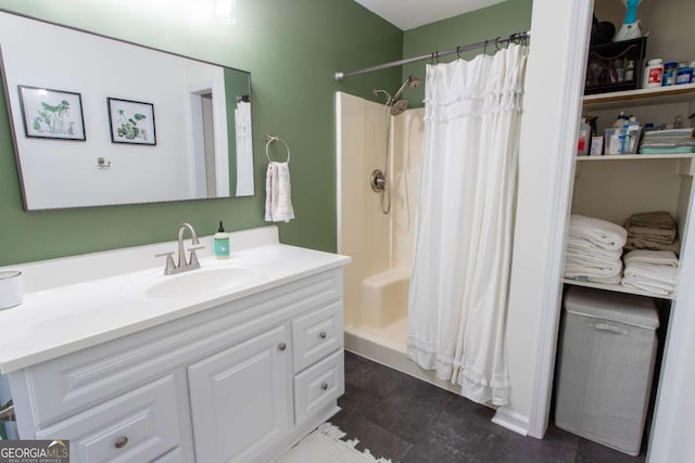 full bath featuring vanity and a shower with shower curtain