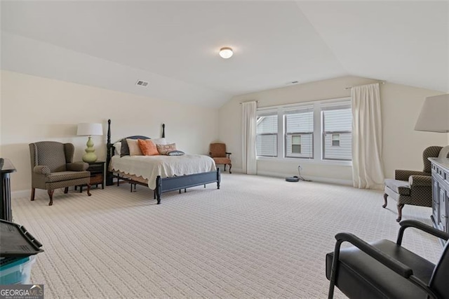 bedroom featuring carpet flooring, baseboards, visible vents, and vaulted ceiling