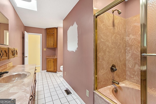 bathroom featuring tile patterned floors, visible vents, toilet, a skylight, and shower / bathtub combination