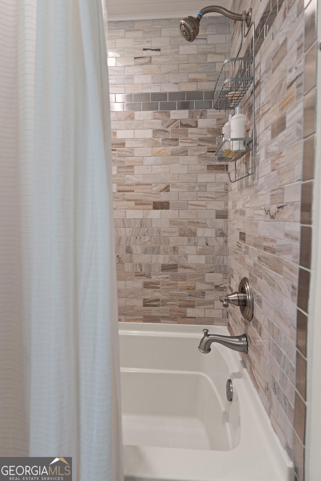 bathroom featuring shower / bath combination with curtain