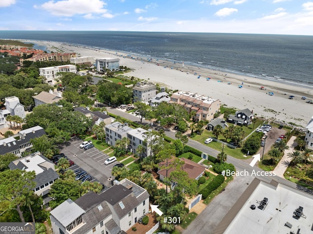 drone / aerial view with a view of the beach and a water view