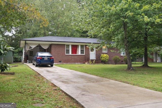 single story home with brick siding, a carport, a front yard, crawl space, and driveway