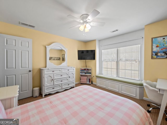 bedroom featuring visible vents and ceiling fan