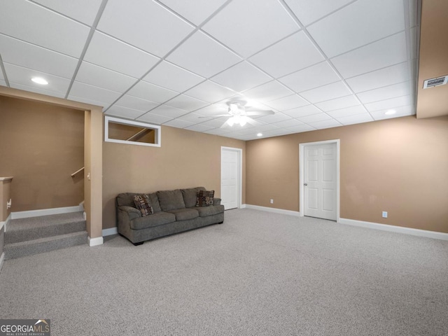 living room with baseboards, visible vents, carpet floors, recessed lighting, and a drop ceiling