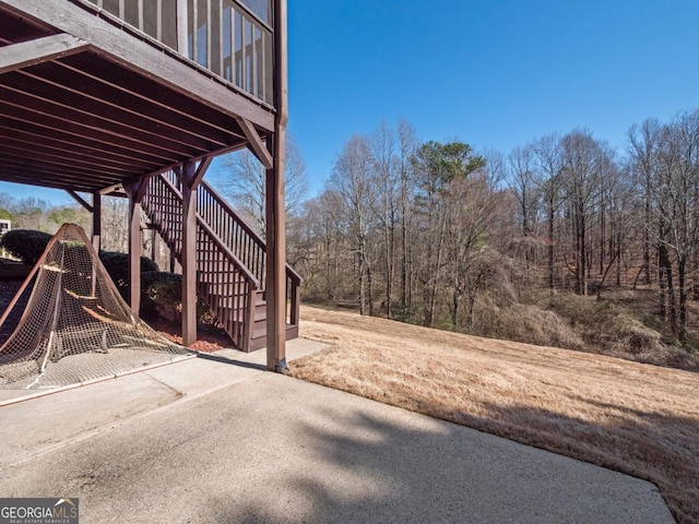 view of patio / terrace featuring stairs