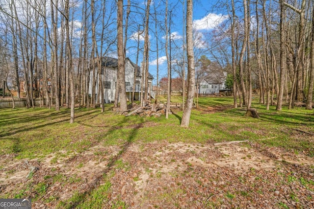 view of yard featuring fence