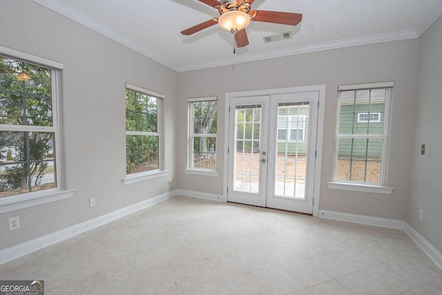 unfurnished sunroom with french doors, visible vents, and ceiling fan