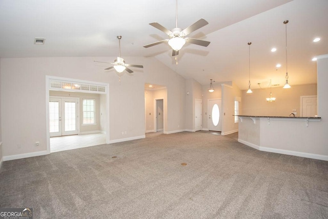 unfurnished living room with french doors, visible vents, carpet floors, and baseboards