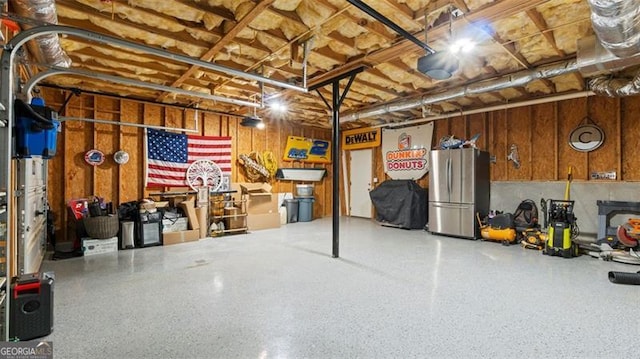 garage with freestanding refrigerator