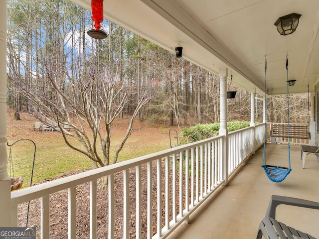 balcony featuring covered porch