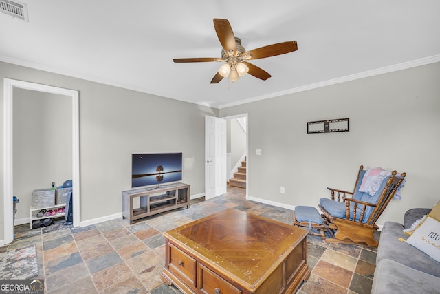 living area with visible vents, baseboards, stone tile floors, and stairs