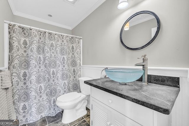 bathroom featuring visible vents, toilet, ornamental molding, a shower with shower curtain, and vanity