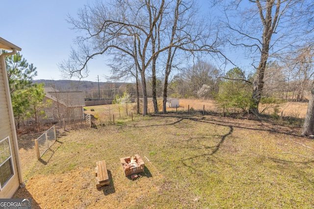 view of yard with fence