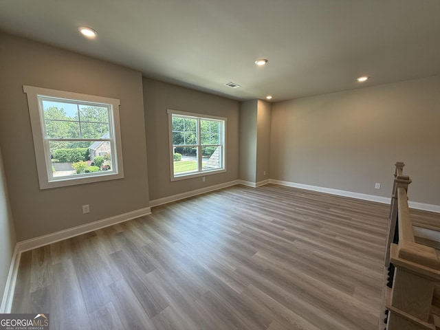 73 Hewett Rd, Pendergrass, GA 30567 - spare room with wood finished floors, baseboards, and recessed lighting