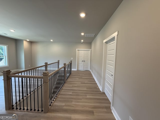 73 Hewett Rd, Pendergrass, GA 30567 - corridor featuring an upstairs landing, wood finished floors, recessed lighting, and baseboards