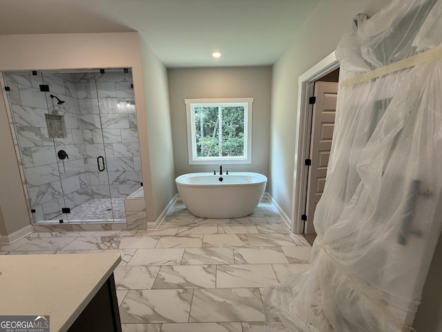 73 Hewett Rd, Pendergrass, GA 30567 - full bathroom featuring marble look tiles, a stall shower, a freestanding bath, baseboards, and recessed lighting