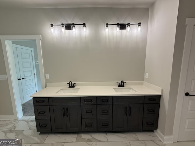 73 Hewett Rd, Pendergrass, GA 30567 - bathroom with marble finish flooring, double vanity, and baseboards