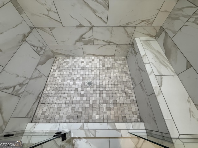 73 Hewett Rd, Pendergrass, GA 30567 - bathroom featuring tiled shower