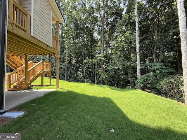 73 Hewett Rd, Pendergrass, GA 30567 - view of grassy yard with stairway and a patio area