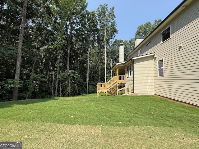 73 Hewett Rd, Pendergrass, GA 30567 - view of green lawn featuring stairway