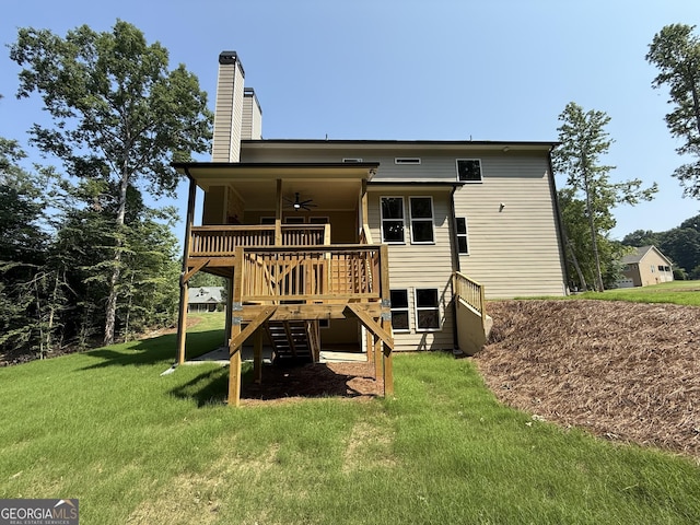 73 Hewett Rd, Pendergrass, GA 30567 - rear view of property featuring a ceiling fan, a yard, a chimney, a deck, and stairs