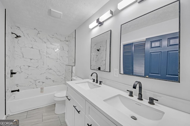 137 Creekview Dr, Woodstock, GA 30188 - full bath featuring toilet, double vanity,  shower combination, a textured ceiling, and marble finish floors