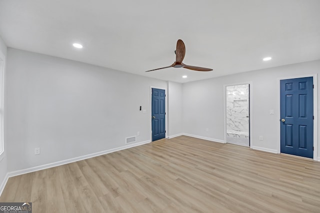 interior space featuring baseboards, visible vents, recessed lighting, ceiling fan, and light wood-type flooring