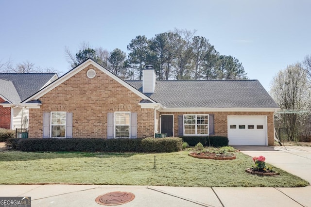 view of front of home featuring a front lawn, brick siding, and driveway