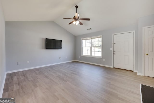 unfurnished living room with light wood finished floors, visible vents, baseboards, ceiling fan, and vaulted ceiling