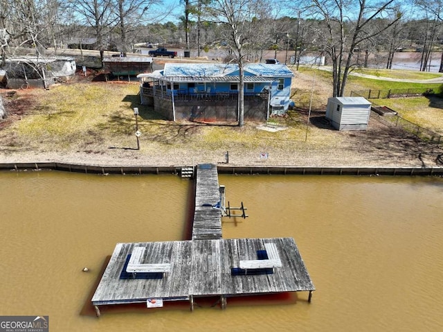 dock area featuring a water view