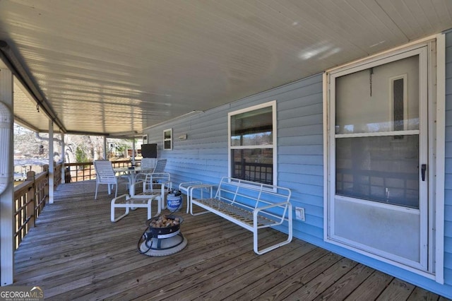 wooden deck featuring a porch