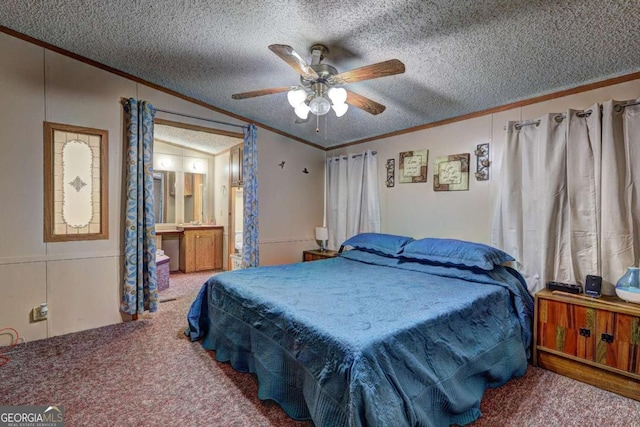 bedroom with crown molding, vaulted ceiling, carpet floors, a textured ceiling, and a ceiling fan