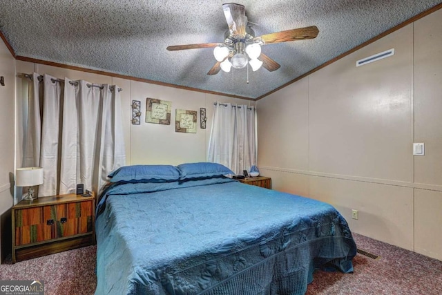 carpeted bedroom with visible vents, a textured ceiling, and ornamental molding