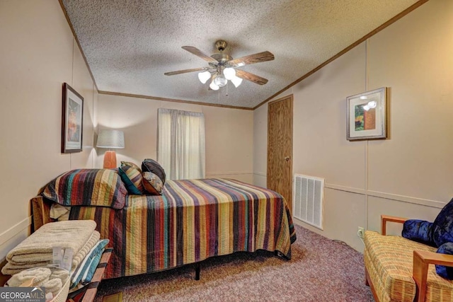 carpeted bedroom featuring visible vents, a textured ceiling, crown molding, and lofted ceiling