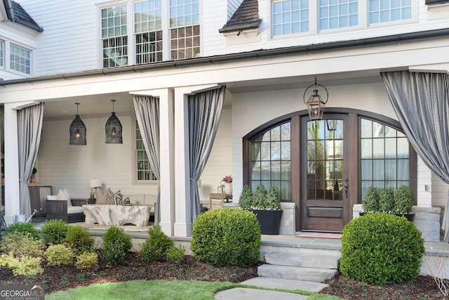 doorway to property with a porch