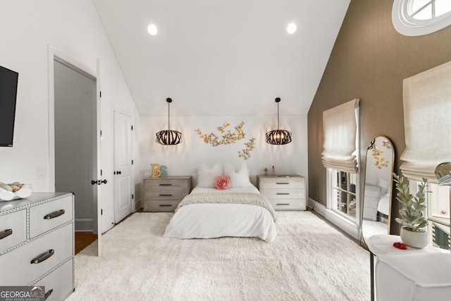 bedroom with carpet flooring, recessed lighting, and high vaulted ceiling