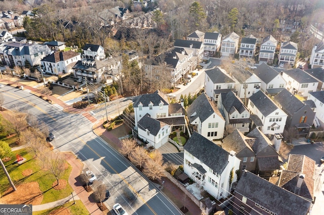 birds eye view of property with a residential view