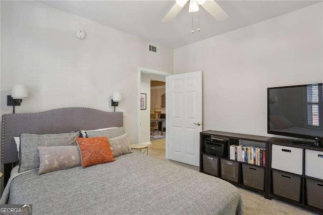 bedroom featuring visible vents and ceiling fan