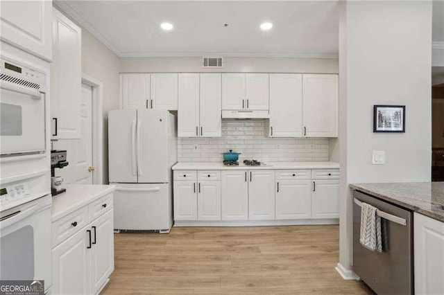 kitchen featuring white cabinetry, white appliances, light wood finished floors, and under cabinet range hood