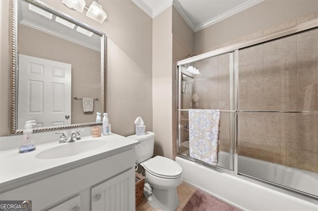 full bath with vanity, bath / shower combo with glass door, ornamental molding, tile patterned floors, and toilet