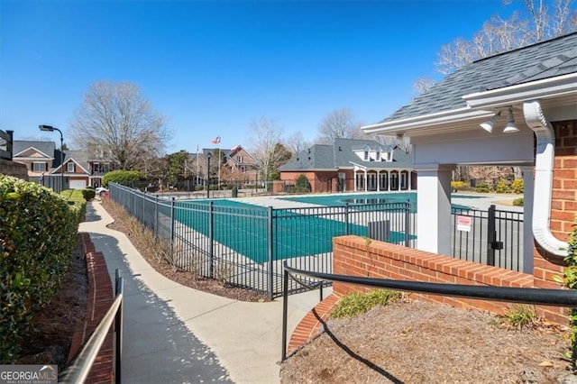 pool featuring fence