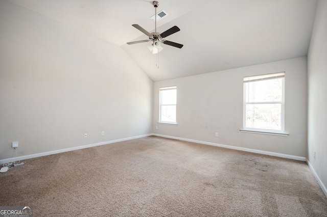 unfurnished room featuring visible vents, ceiling fan, baseboards, lofted ceiling, and carpet flooring