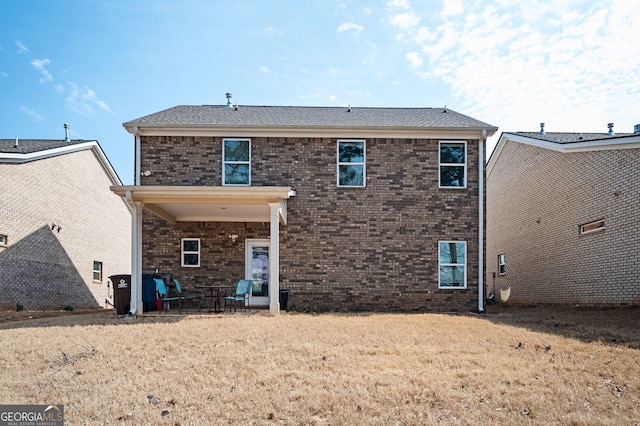 back of property with brick siding