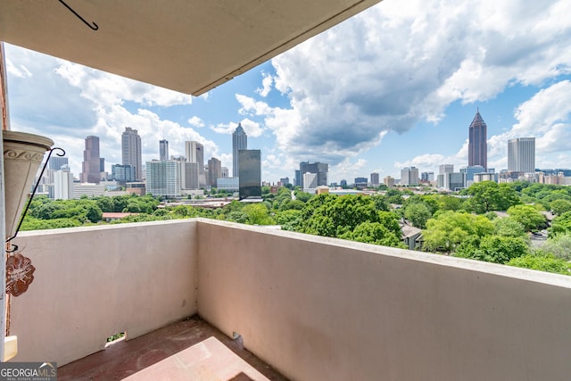 balcony featuring a city view