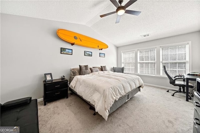 bedroom featuring light carpet, visible vents, baseboards, and lofted ceiling