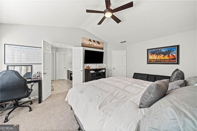 bedroom featuring ceiling fan, lofted ceiling, visible vents, and light carpet