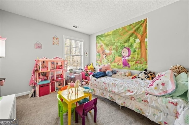 carpeted bedroom with baseboards, visible vents, and a textured ceiling